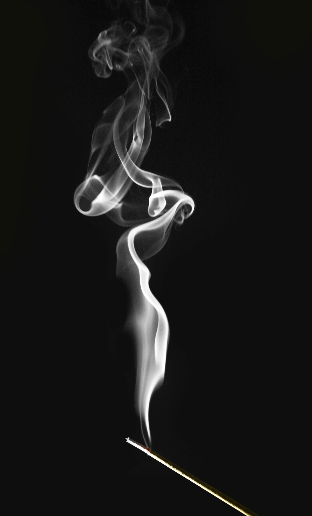 Incense stick and smoke