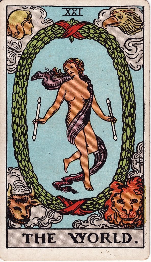 The World card meaning - symbolism of wreath and central figure in Rider-Waite-Smith deck.