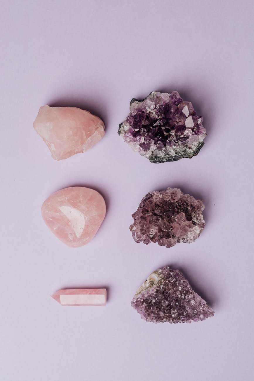 photo of rose quartz beside amethyst