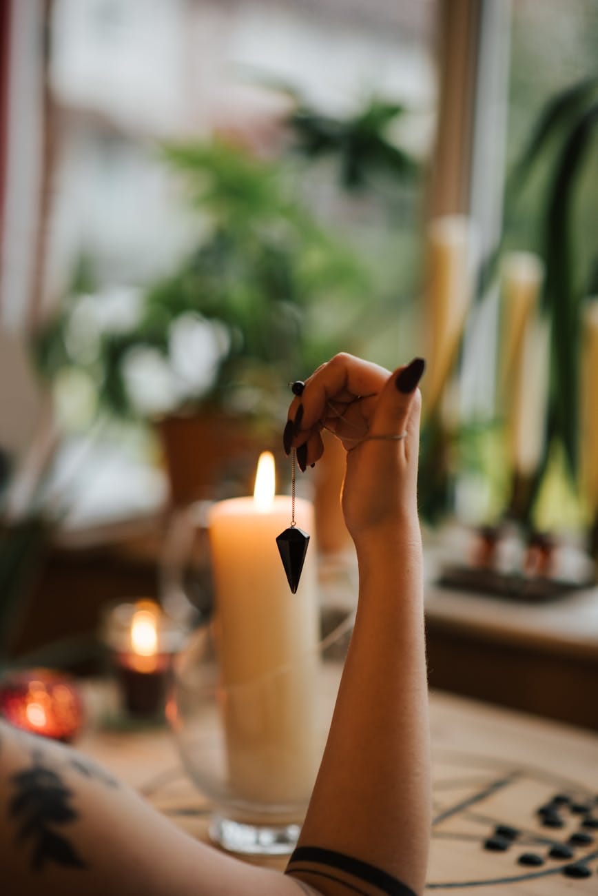 crop fortune teller with amulet during divination process